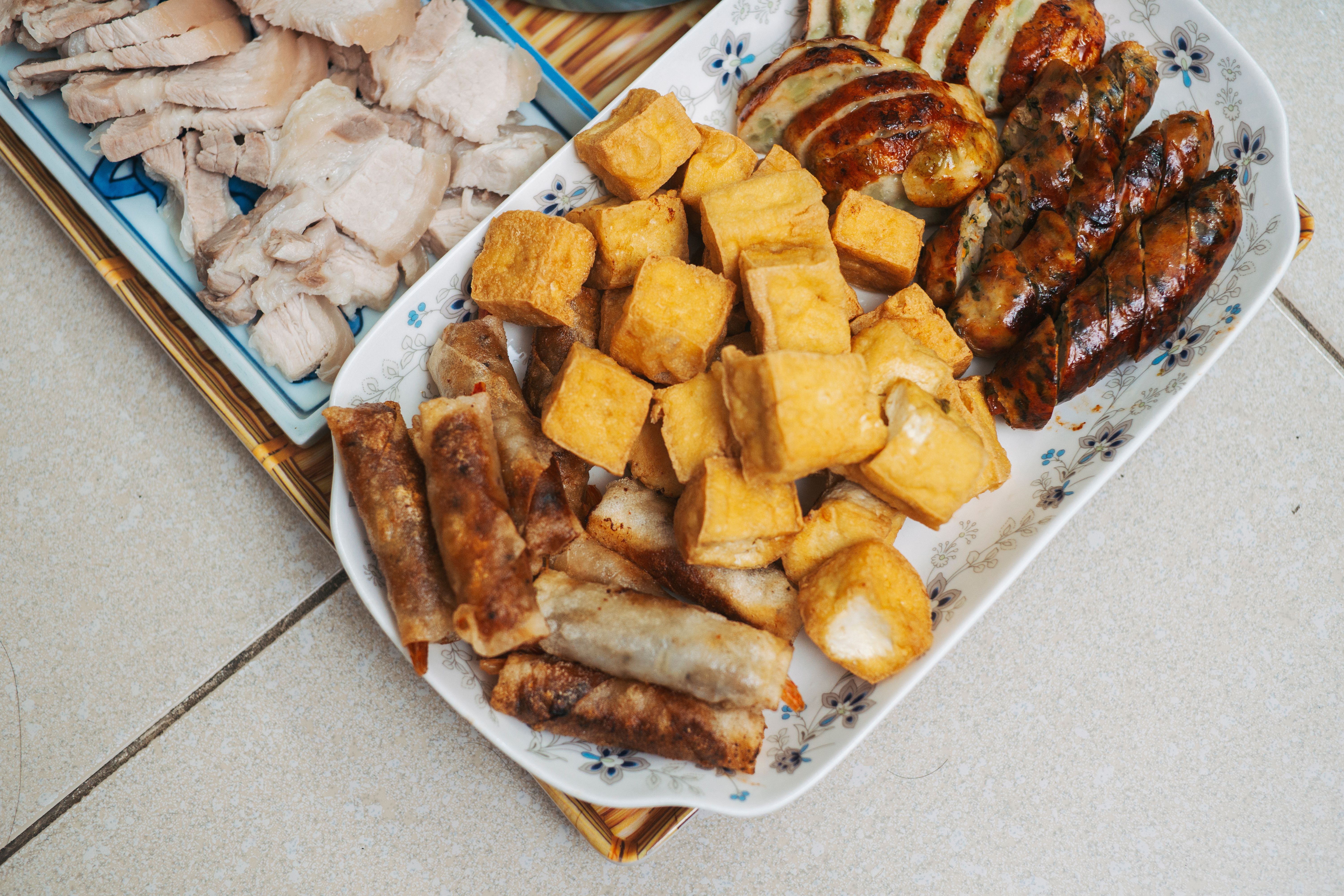 Platter with sausages, fries, and nuggets