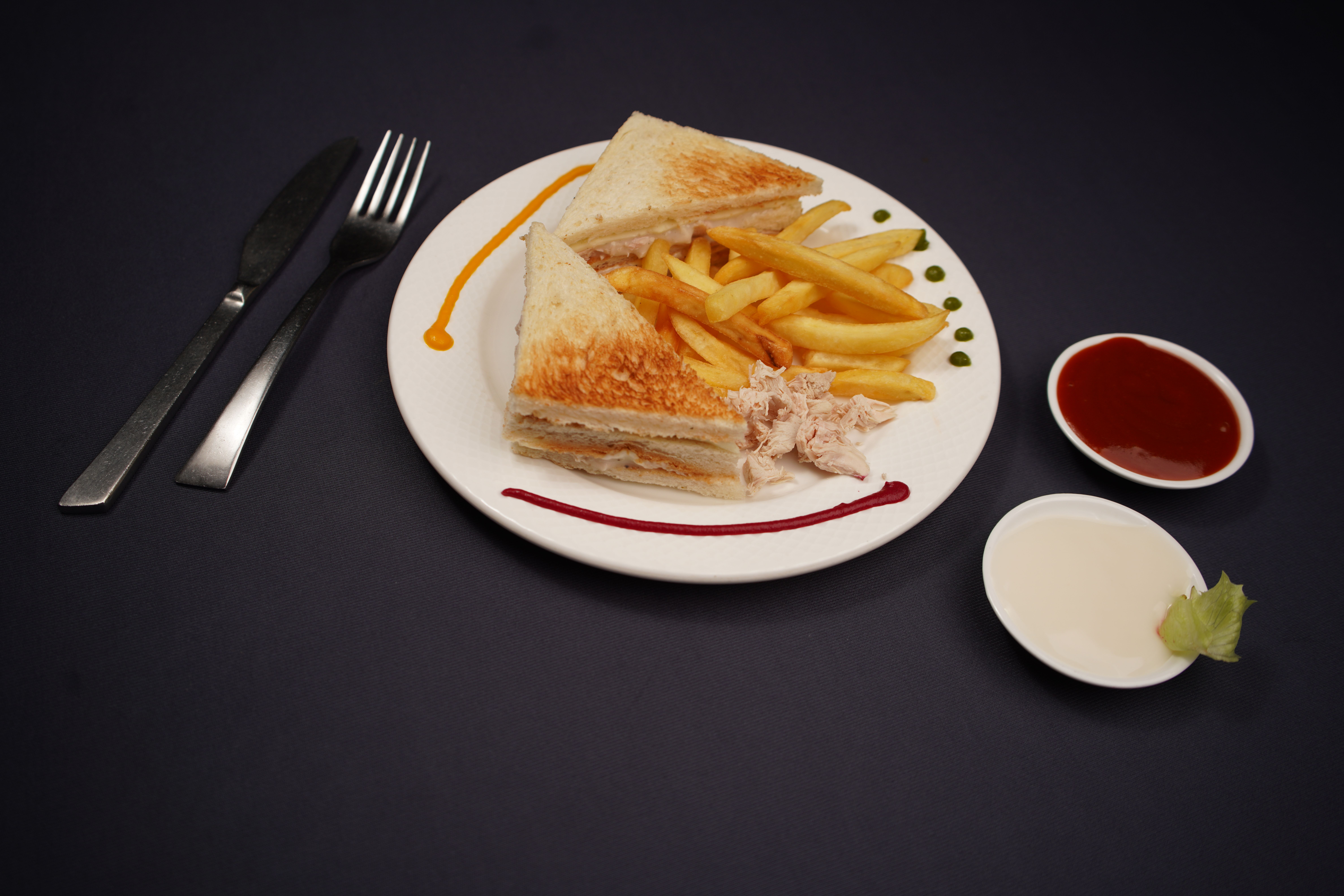 Large yengen sandwich with special sauce and multiple fillings