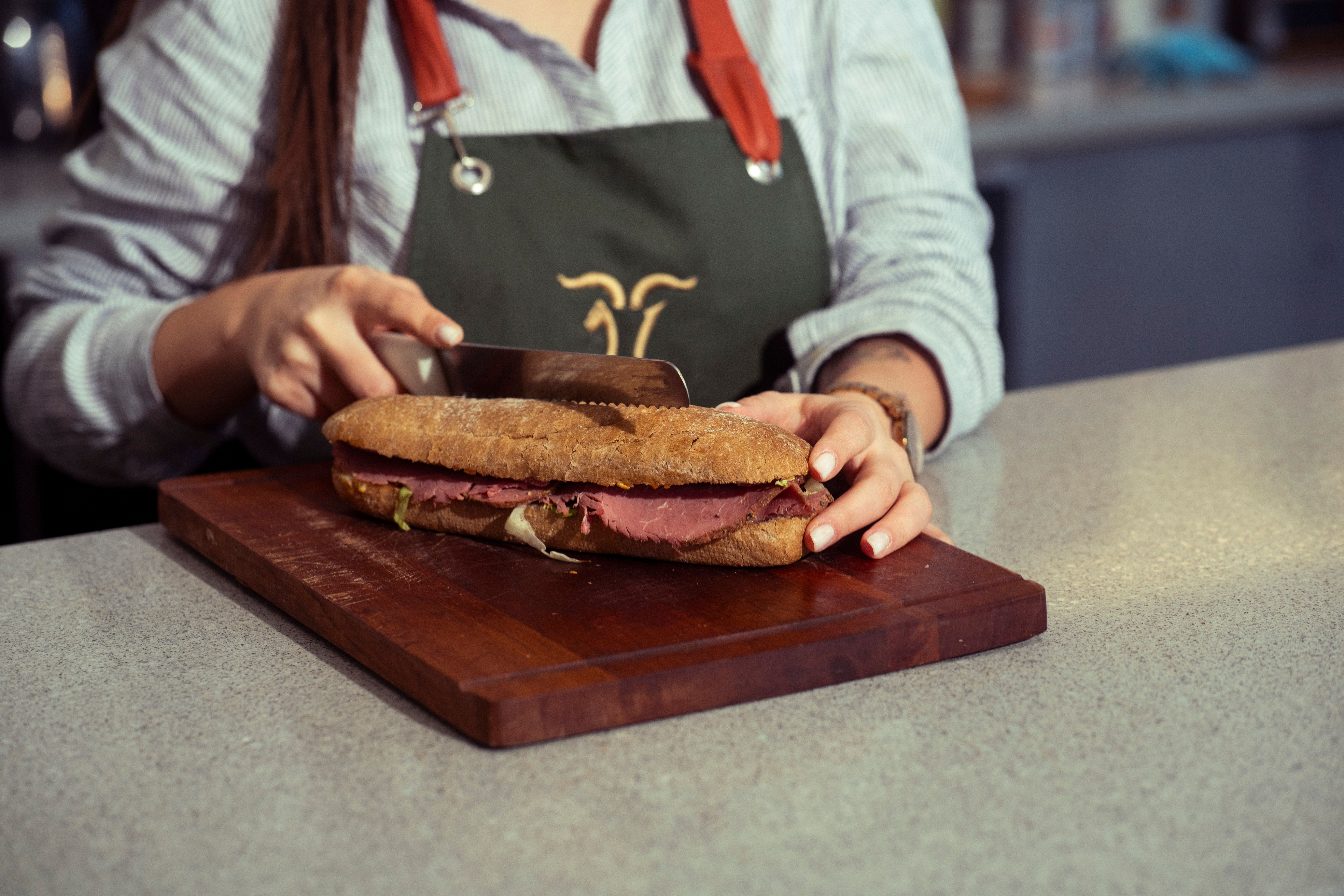 Chef preparing a sandwich