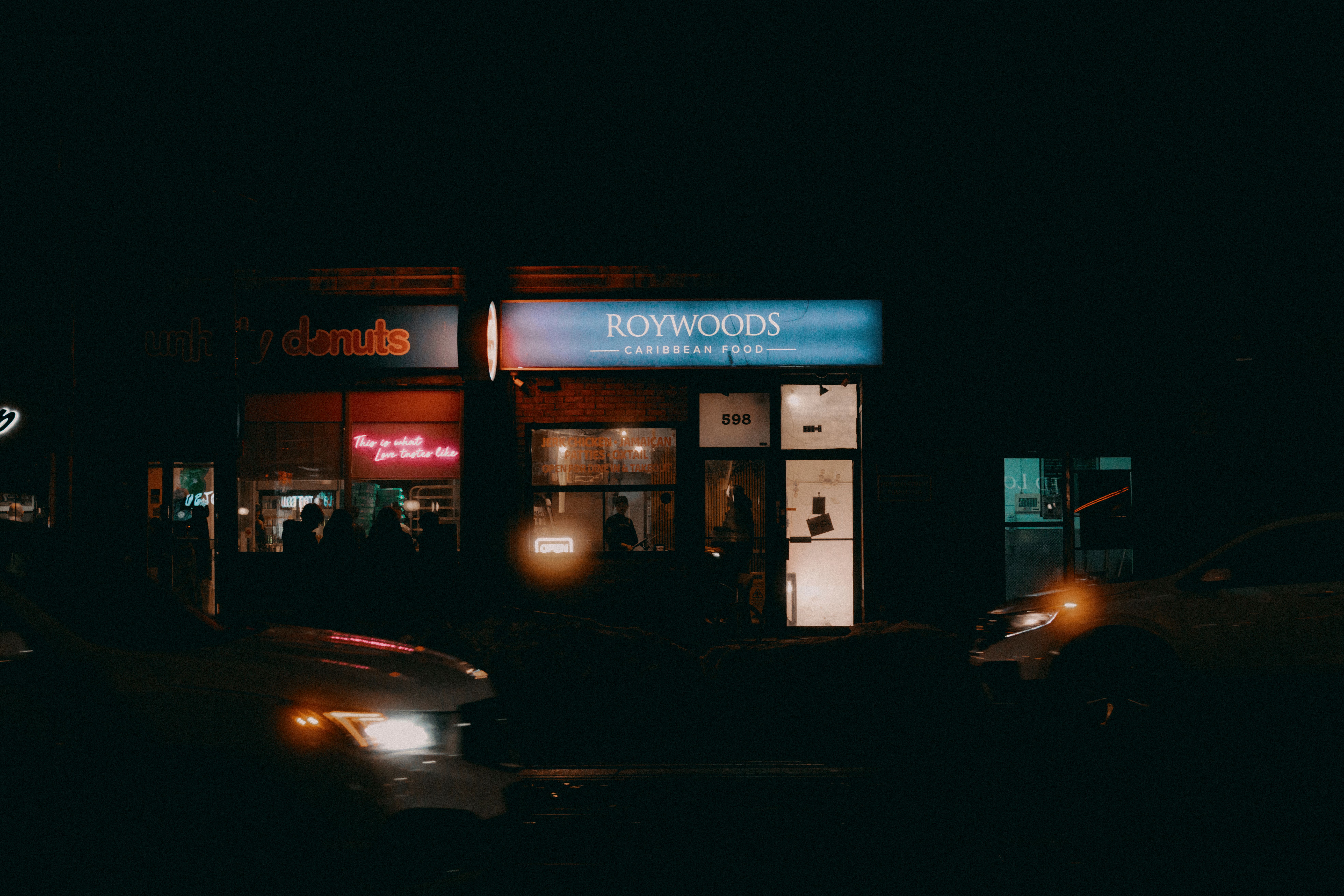 The restaurant's storefront with a bright sign
