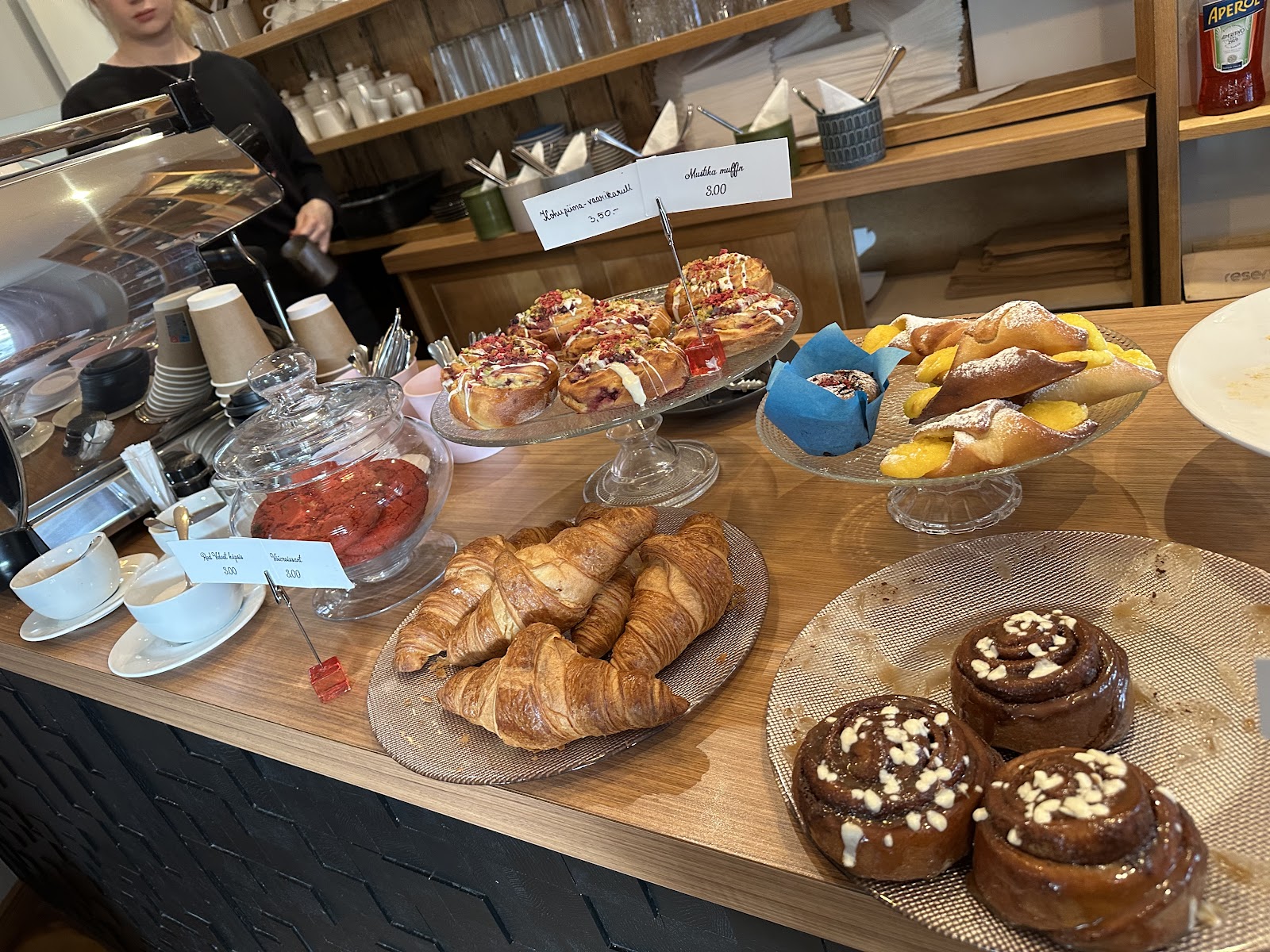 Detailed shot of a flaky croissant on a small plate