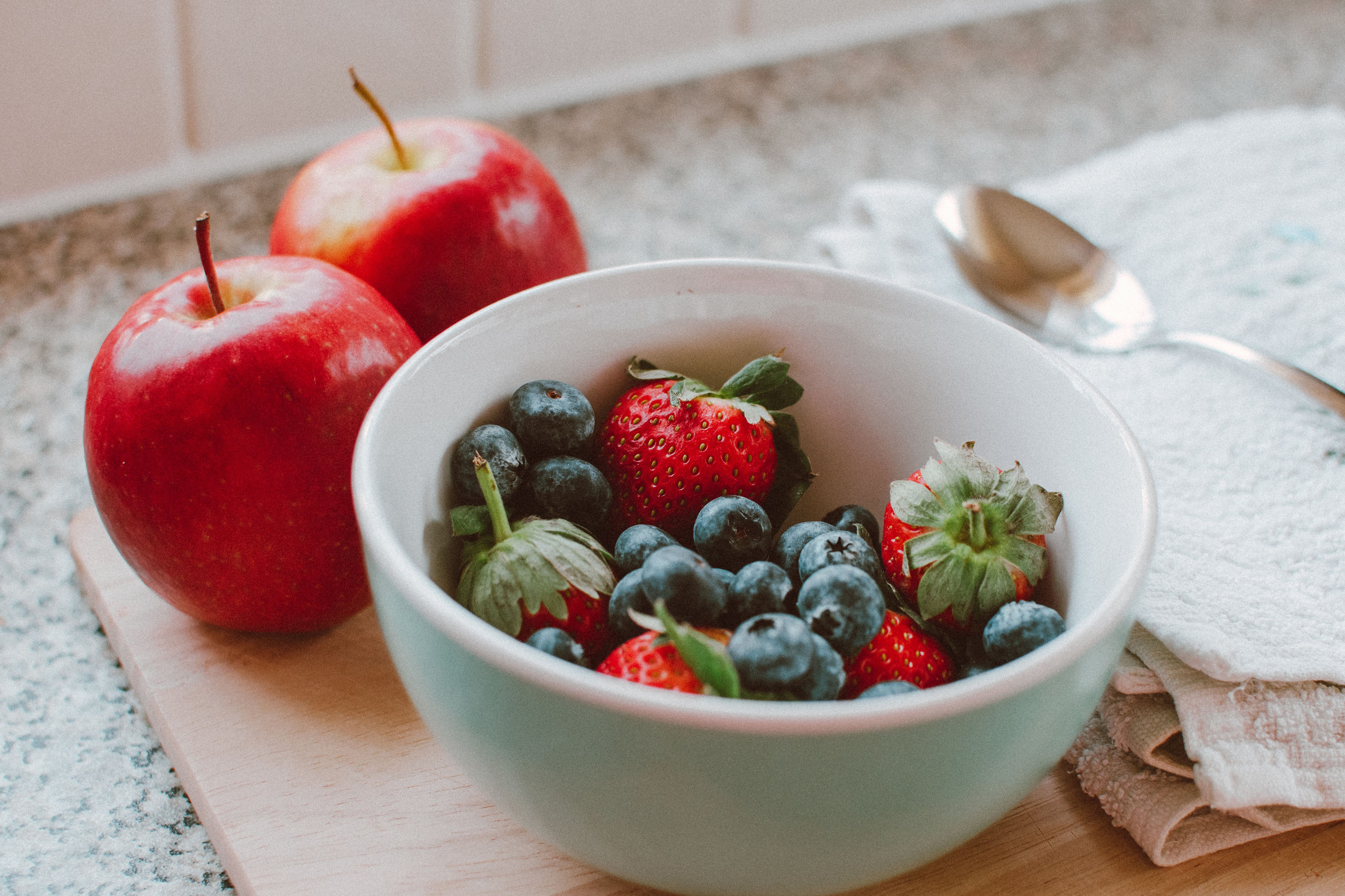 Bowl of fresh seasonal berries and fruits
