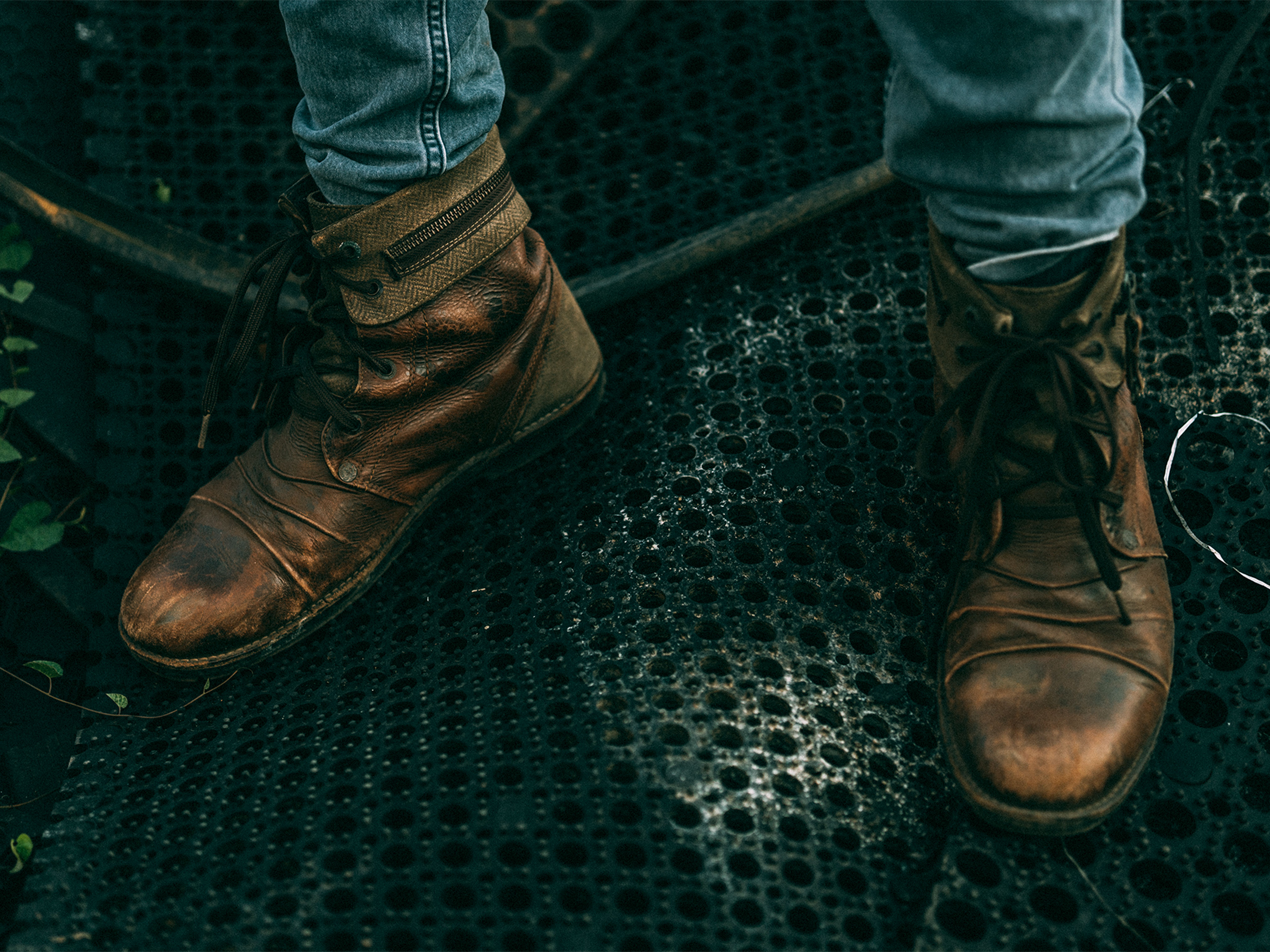 Row of vintage leather boots in various shades of brown