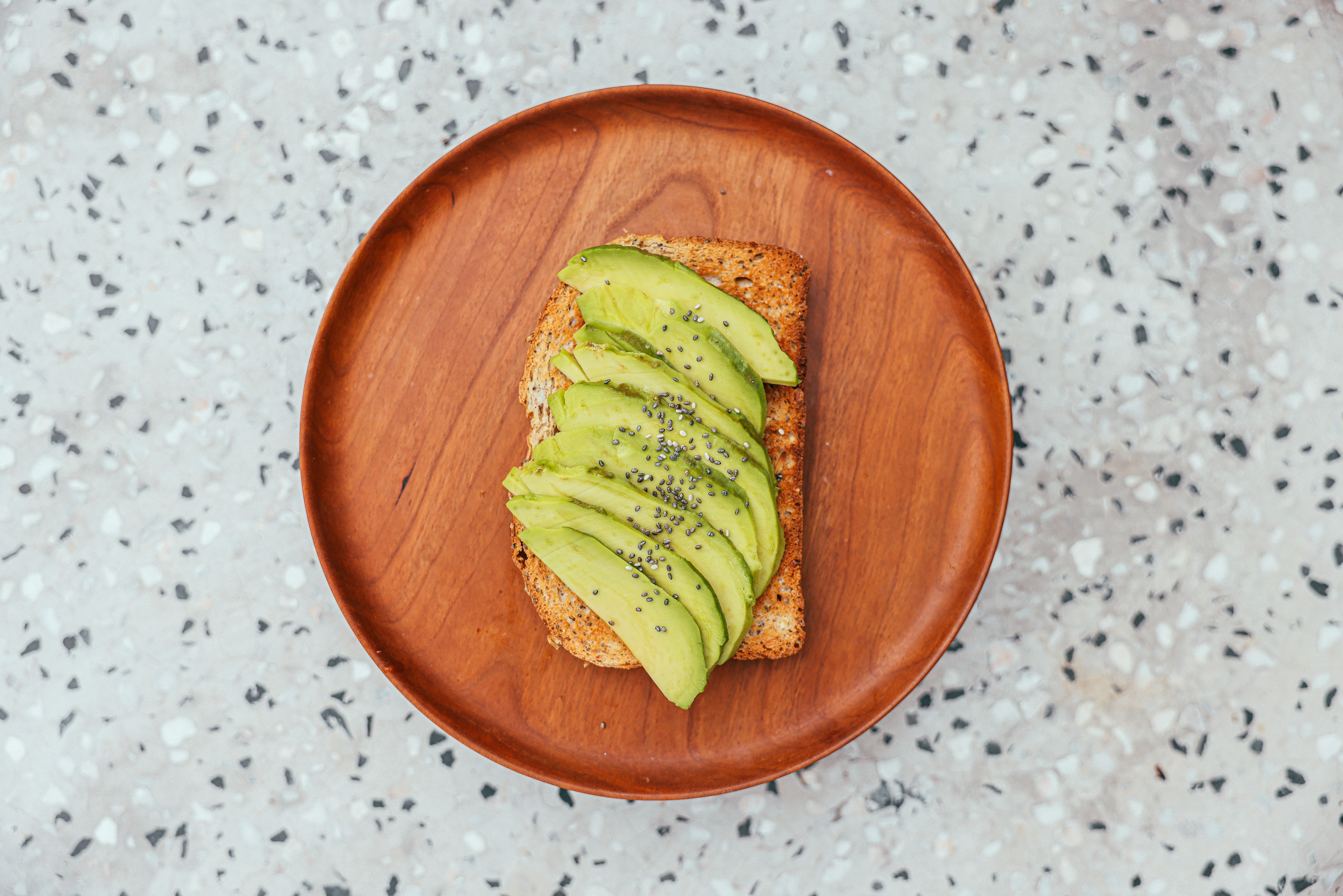 Avocado slices on toasted sourdough bread