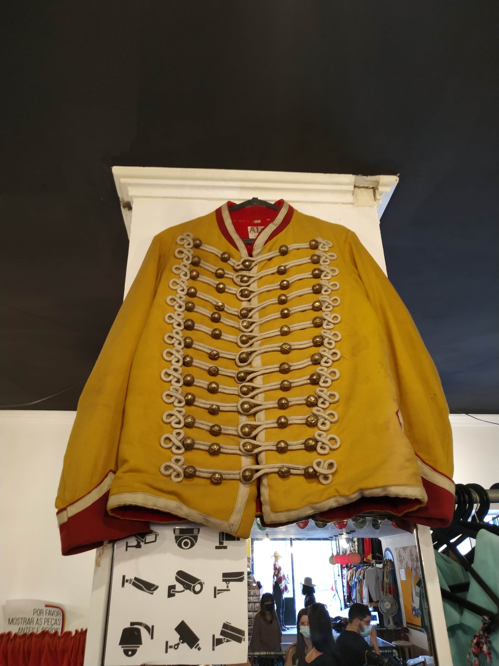 Close-up of a neon sign inside a retro clothing store