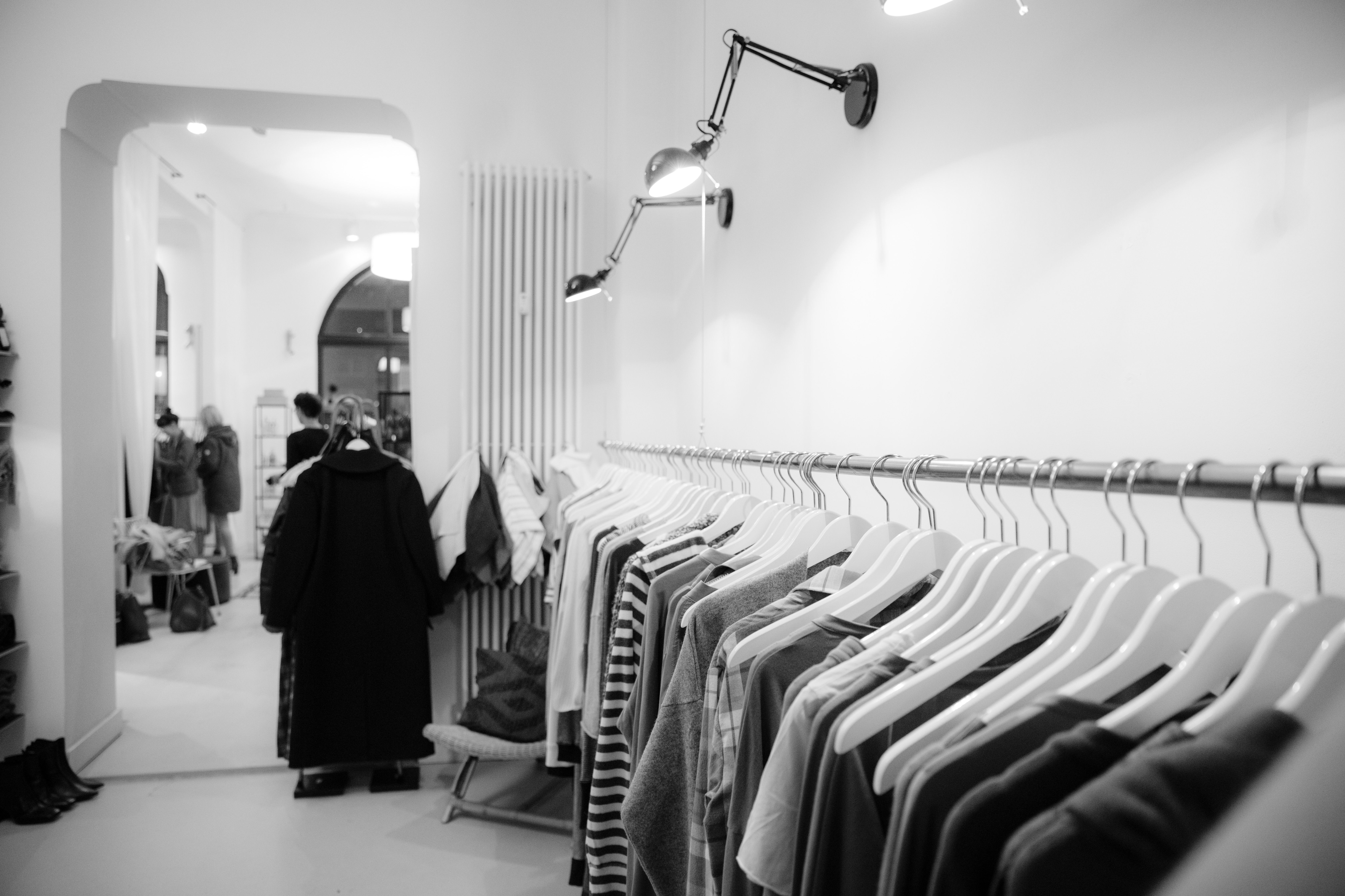 Interior view of a shop on Rua Maria Andrade with vinyl records and clothing racks